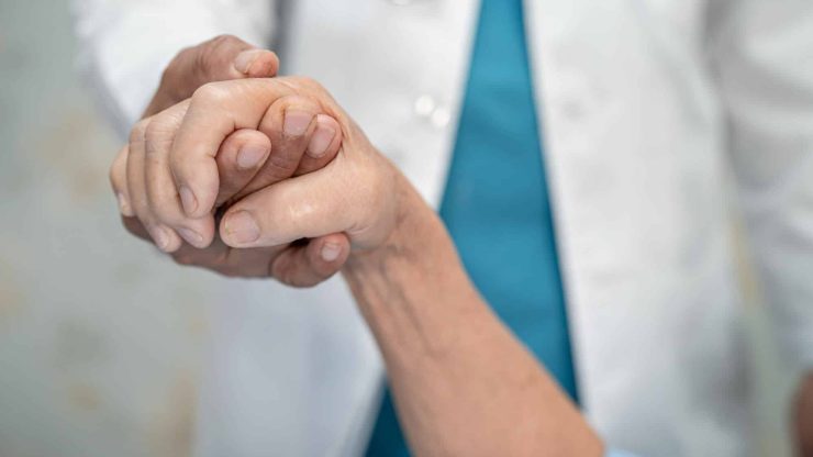 Holding hands Asian senior or